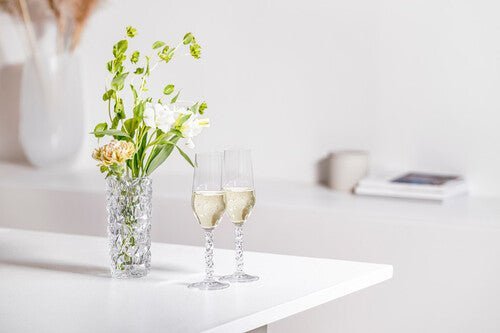 Orrefors Carat Champagne Flutes (8oz): Luminous Elegance by Lena Bergström - dwellandremainOrrefors