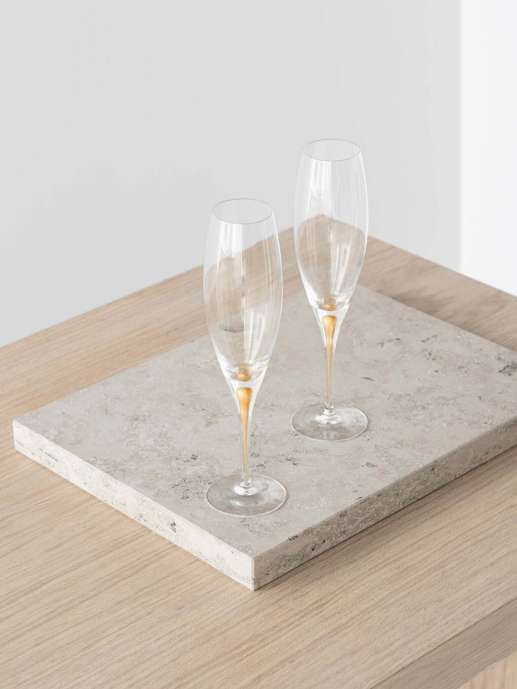 Orrefors Intermezzo Gold Champagne Flutes (7oz): Celebrate in Style - dwellandremainOrrefors