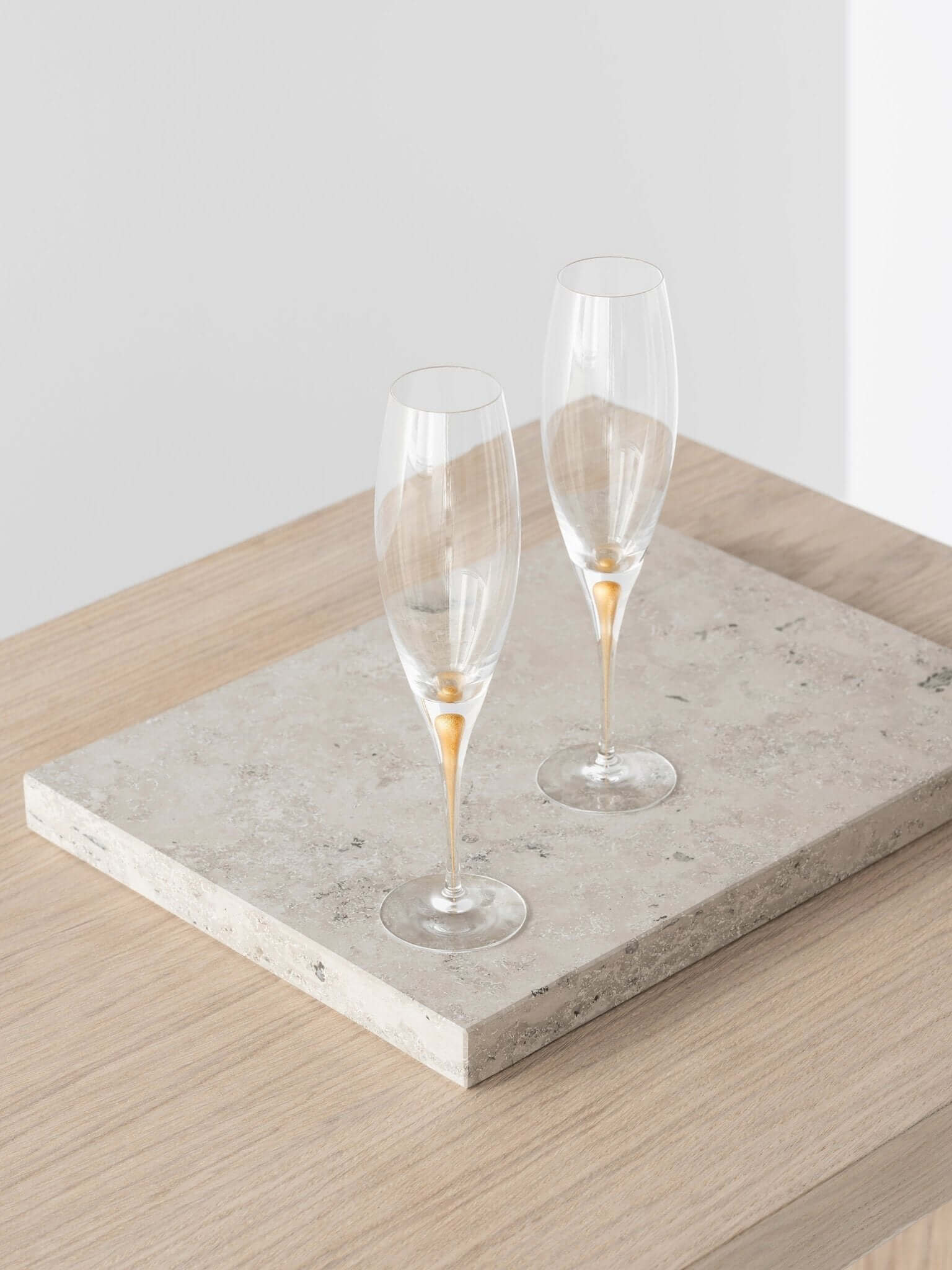 Orrefors Intermezzo Gold Champagne Flutes (7oz): Celebrate in Style - dwellandremainOrrefors
